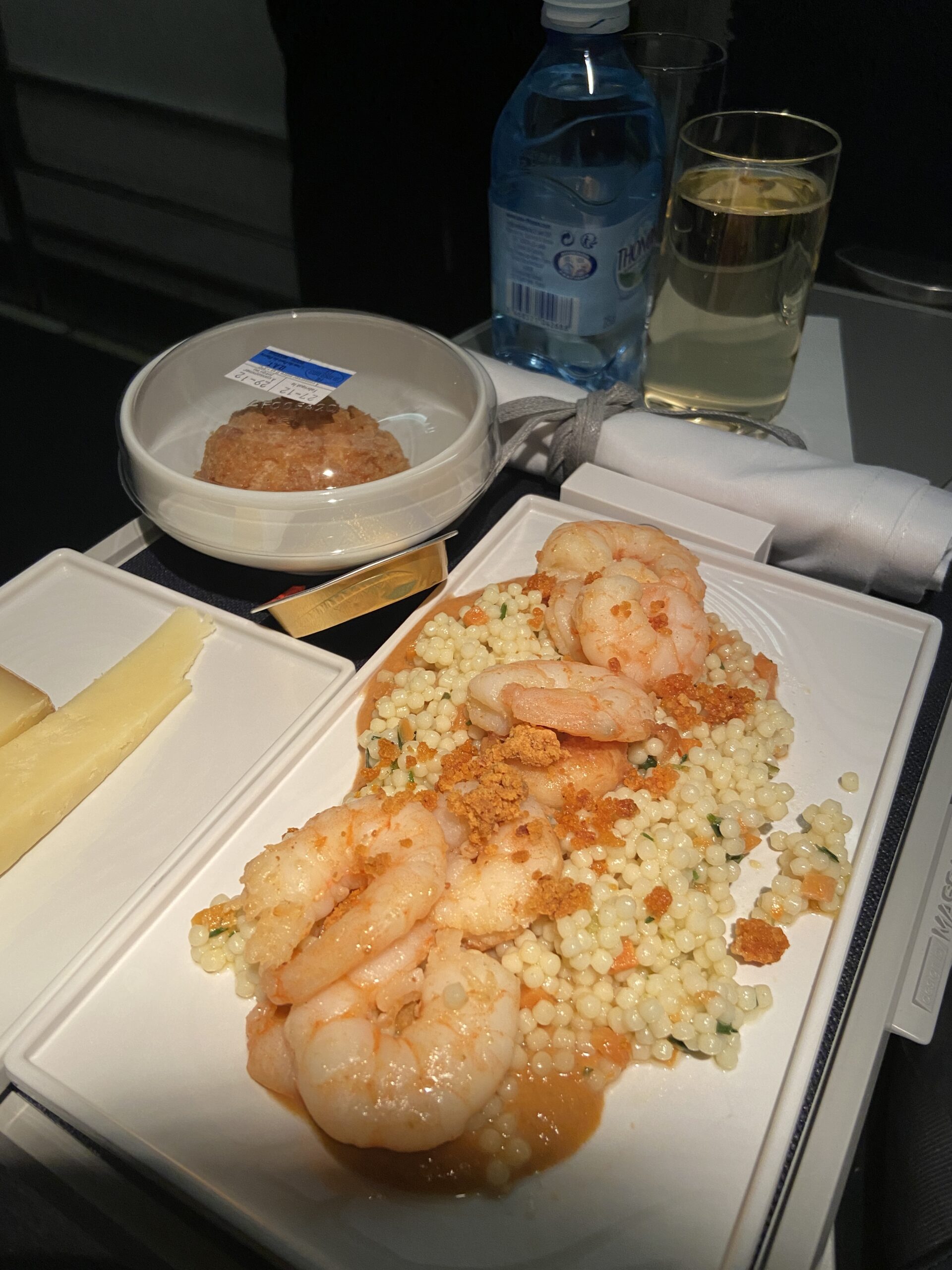 air france business class: shrimp couscous salad, served with a cheese plate and a small pastry