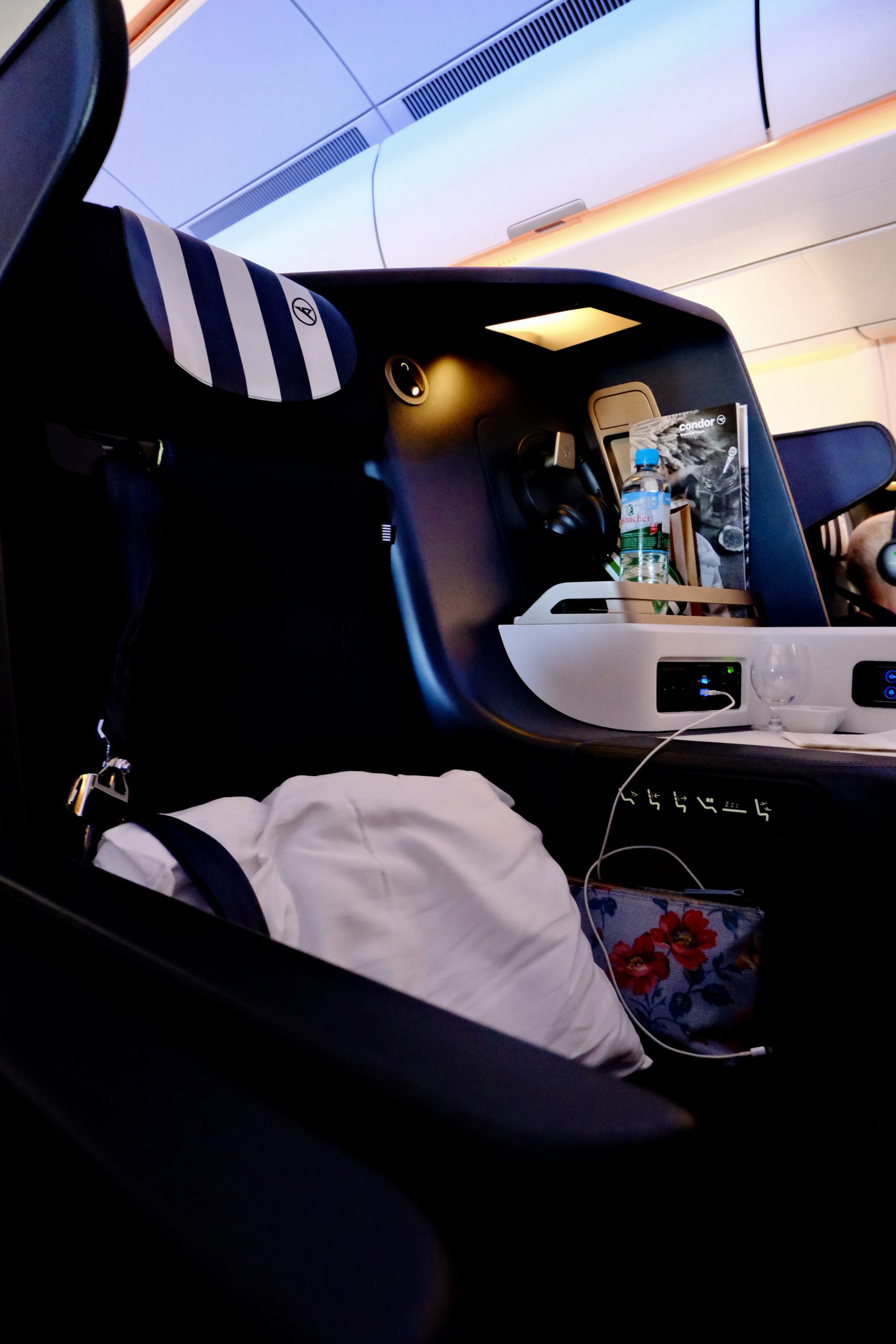 Condor business class seat - sleek navy blue bucket seat