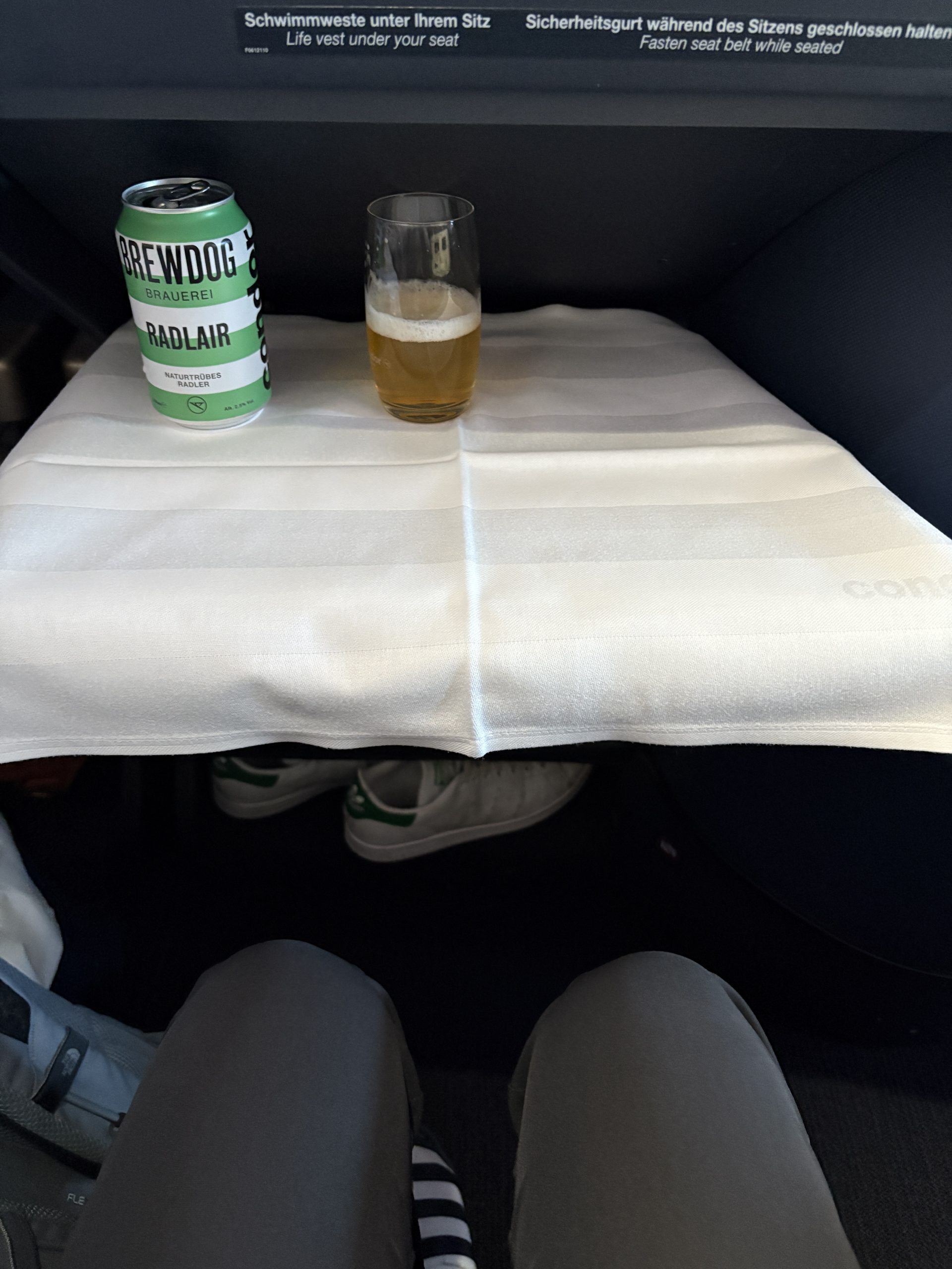 Tray table can be pushed back to allow space to exit the seat