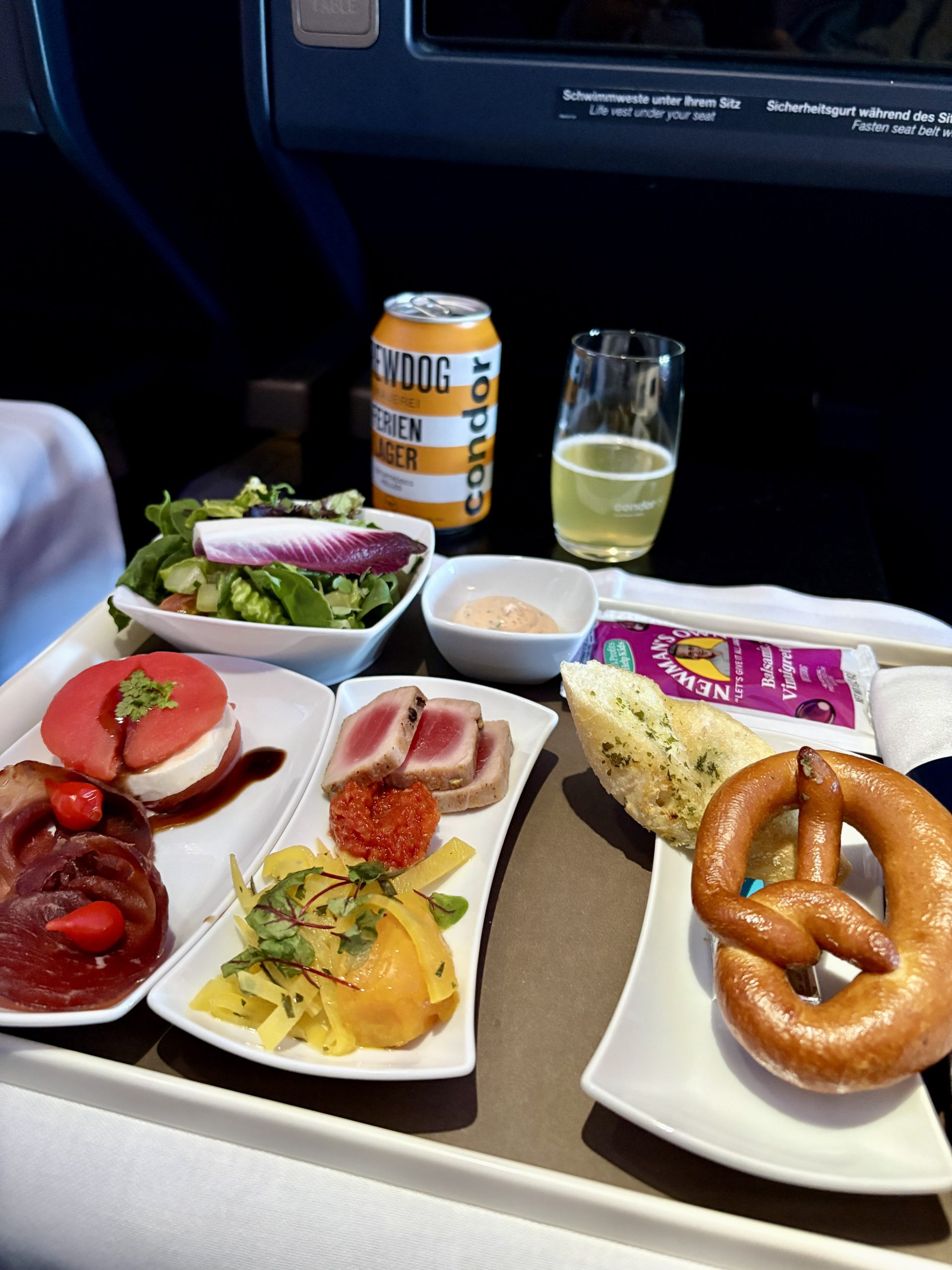 trio of starters: mixed greens with vinaigrette, tuna and beetroot, and a pepper dip