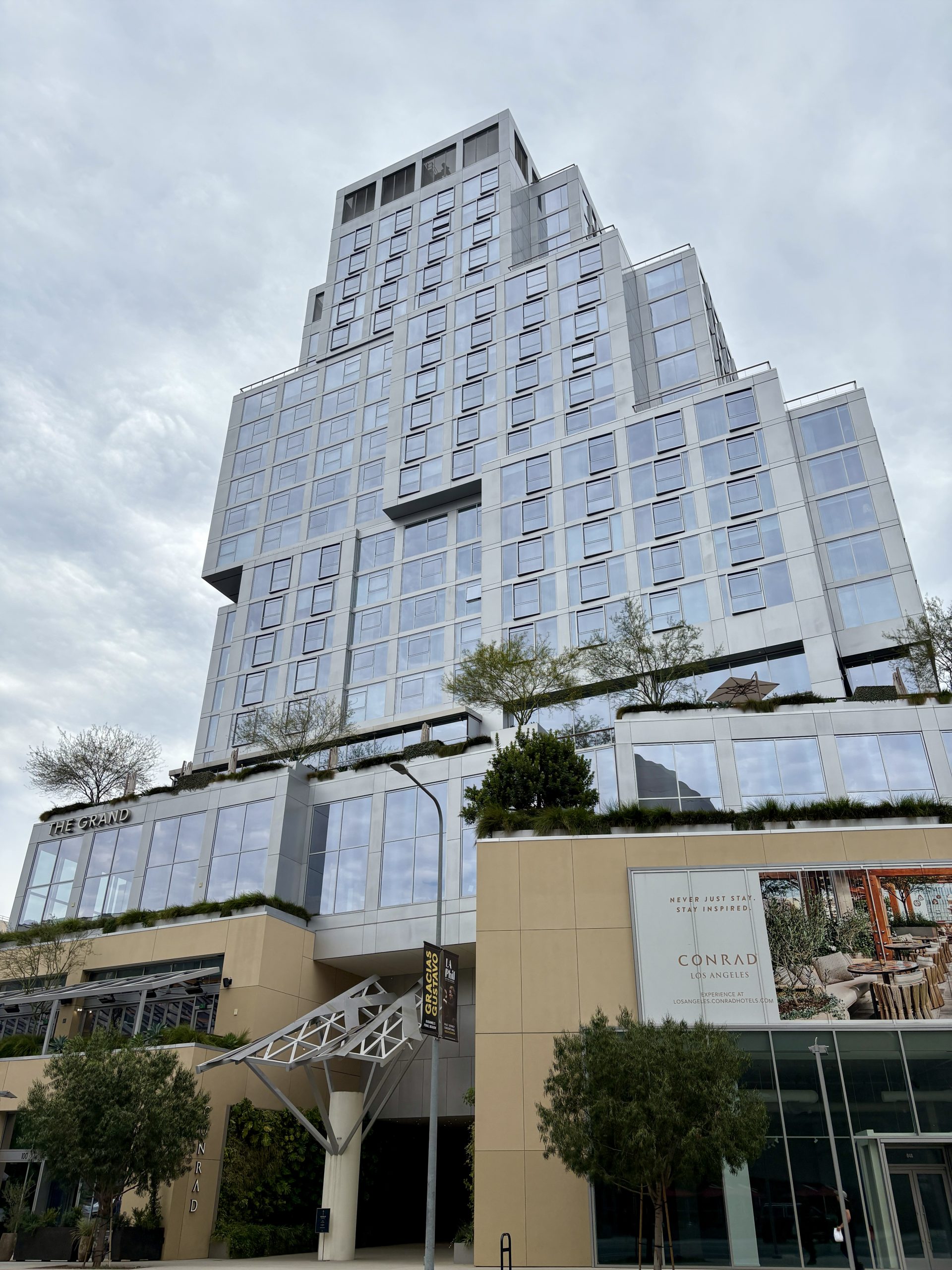 The boxy building of the Conrad shows huge contrasts with the curving shape of the Walt Disney Hall