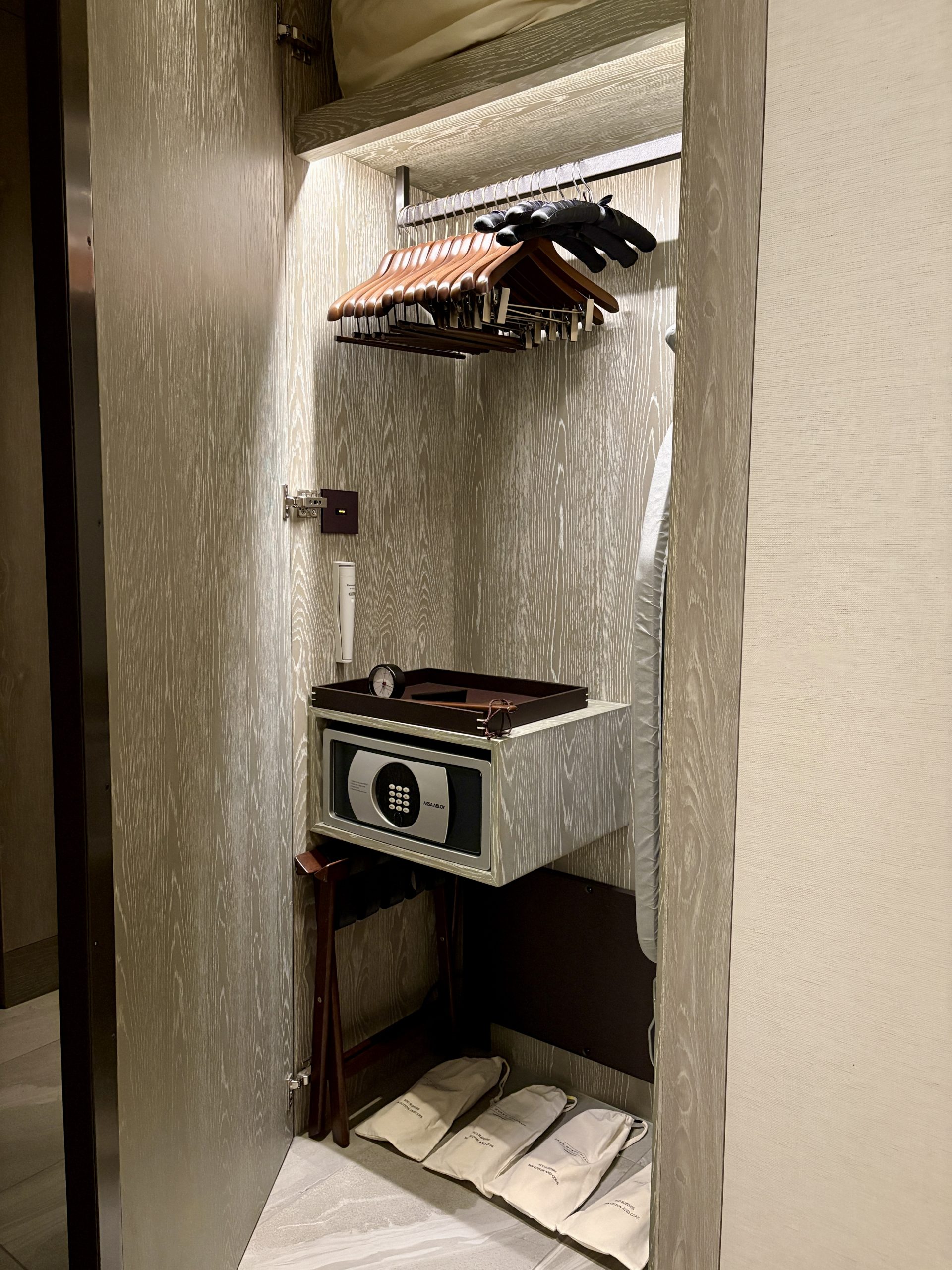 Heated closet next to the entrance with indoor slipper