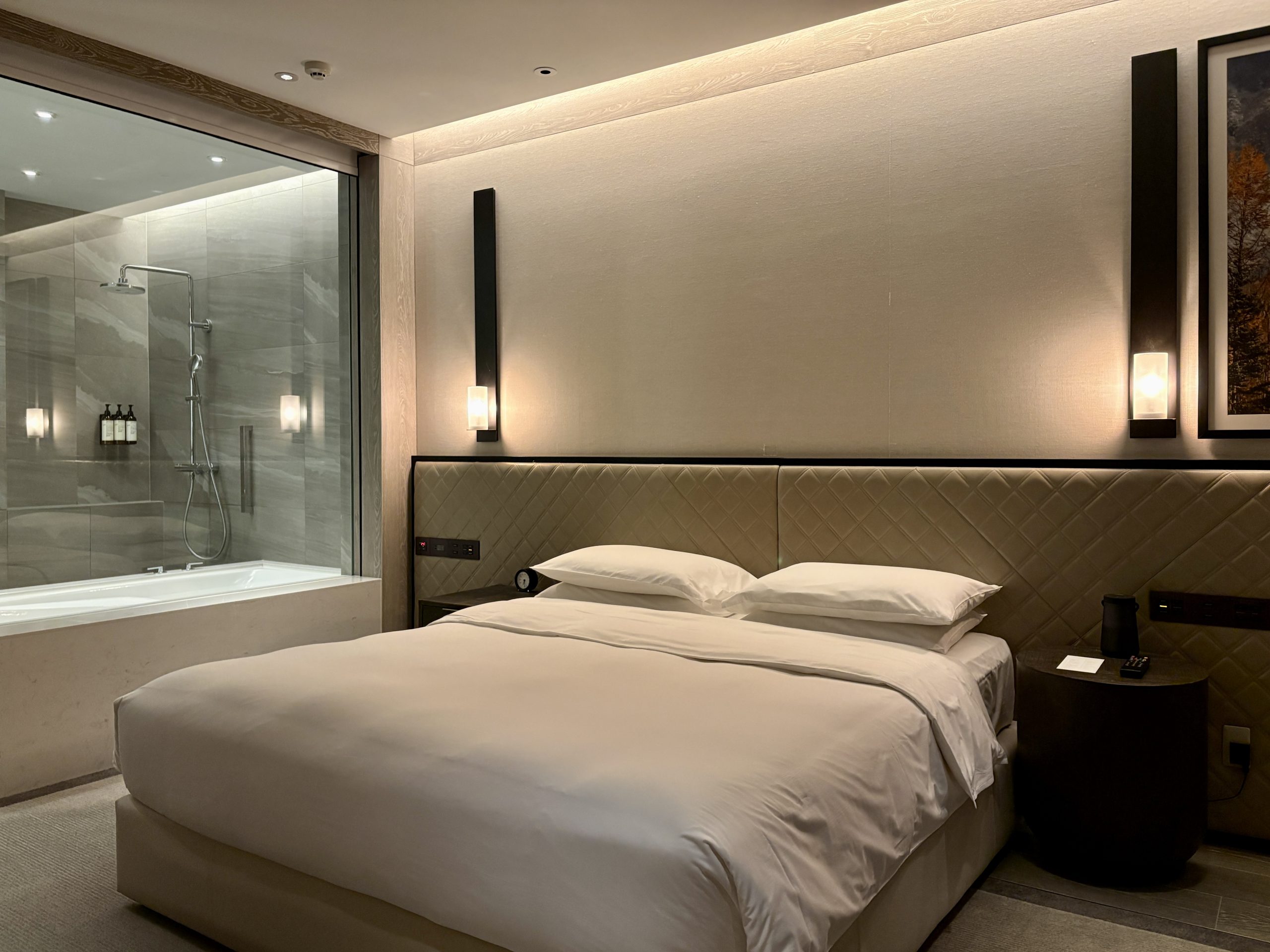 King bed at the center of the master bedroom