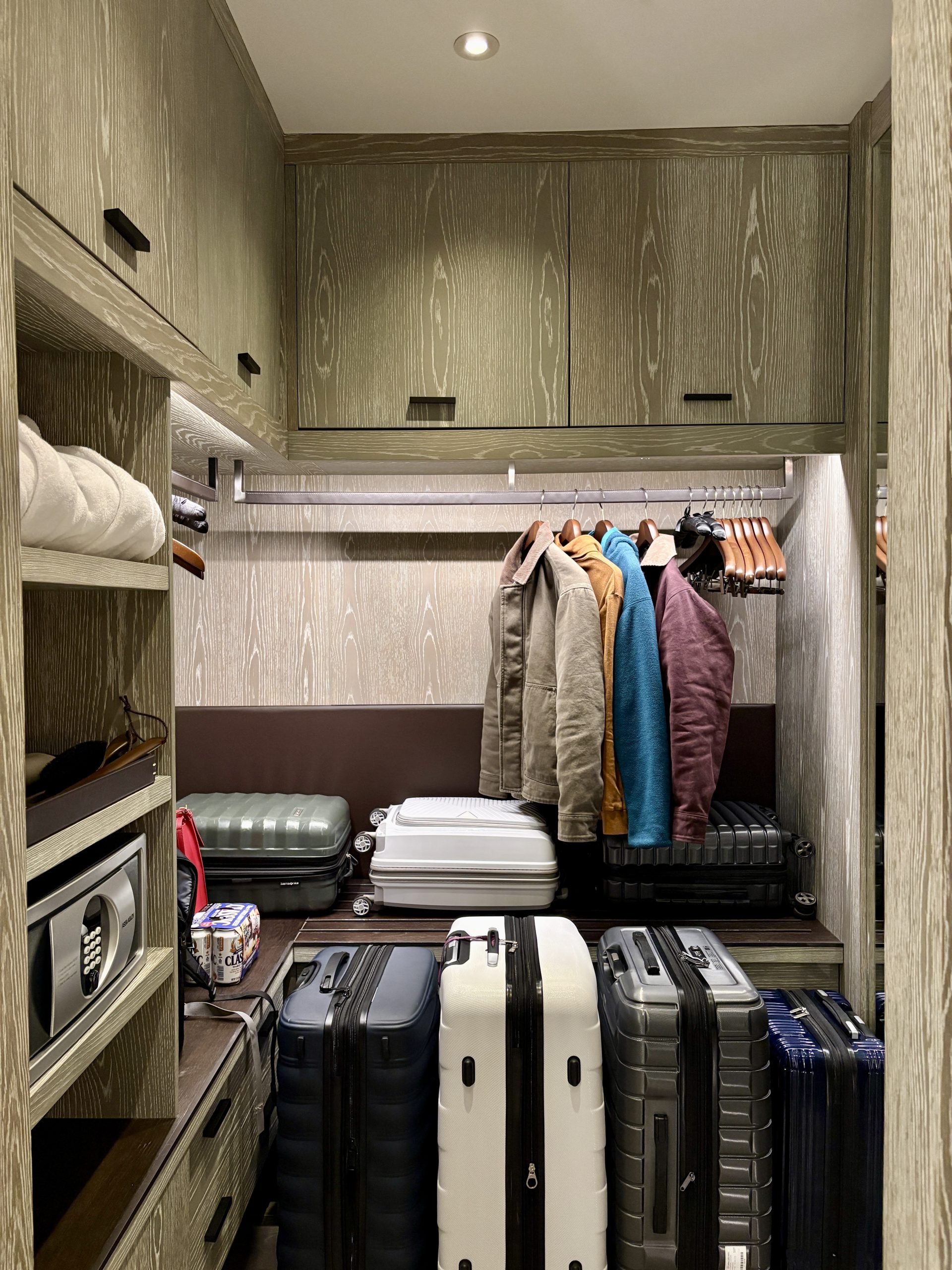 Spacious walk in closet storing all our luggages