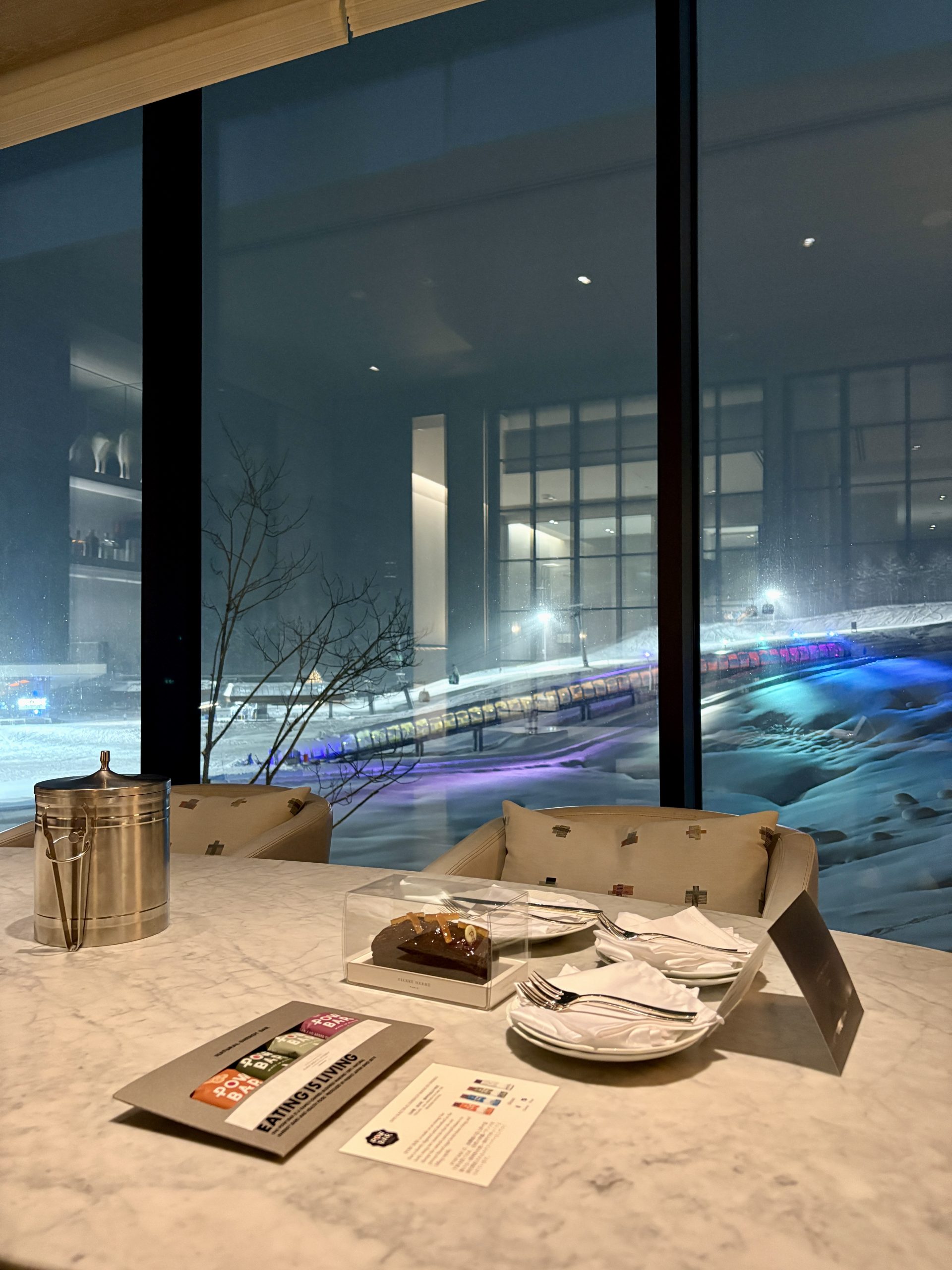 Welcome gifts of energy bars, and cake with a stunning view of the ski slope