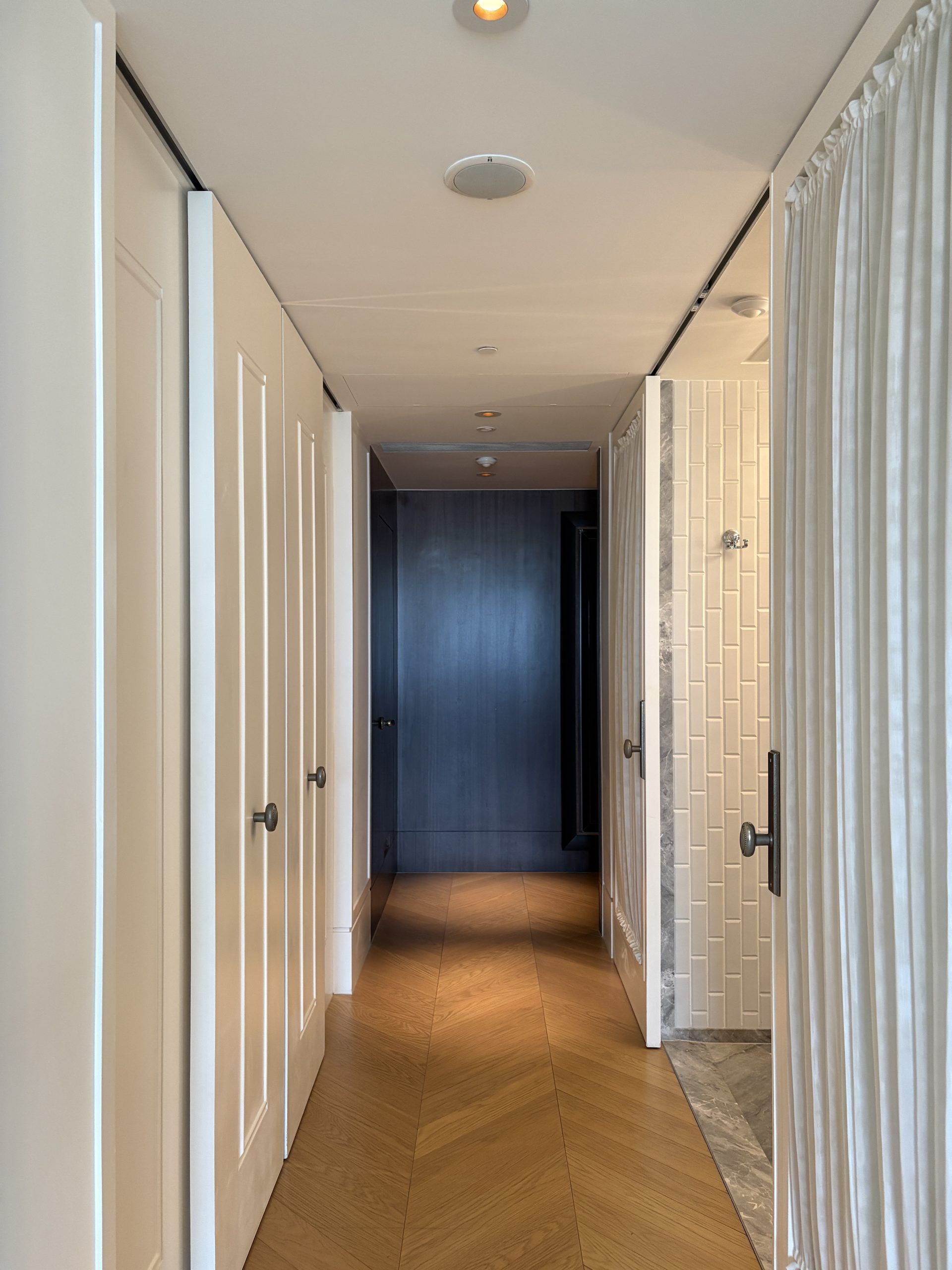 Hallway connecting the foyer to the room