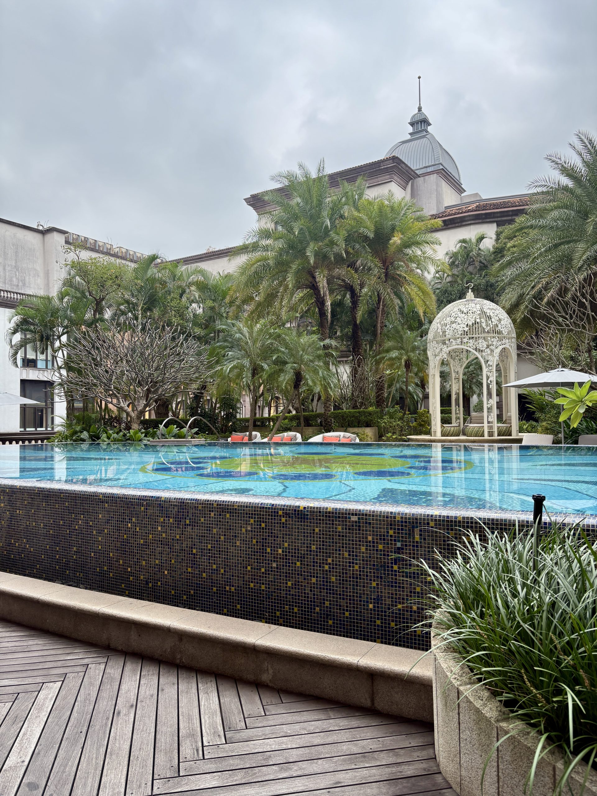 Outdoor swimming pool with beautiful mosaic tiles