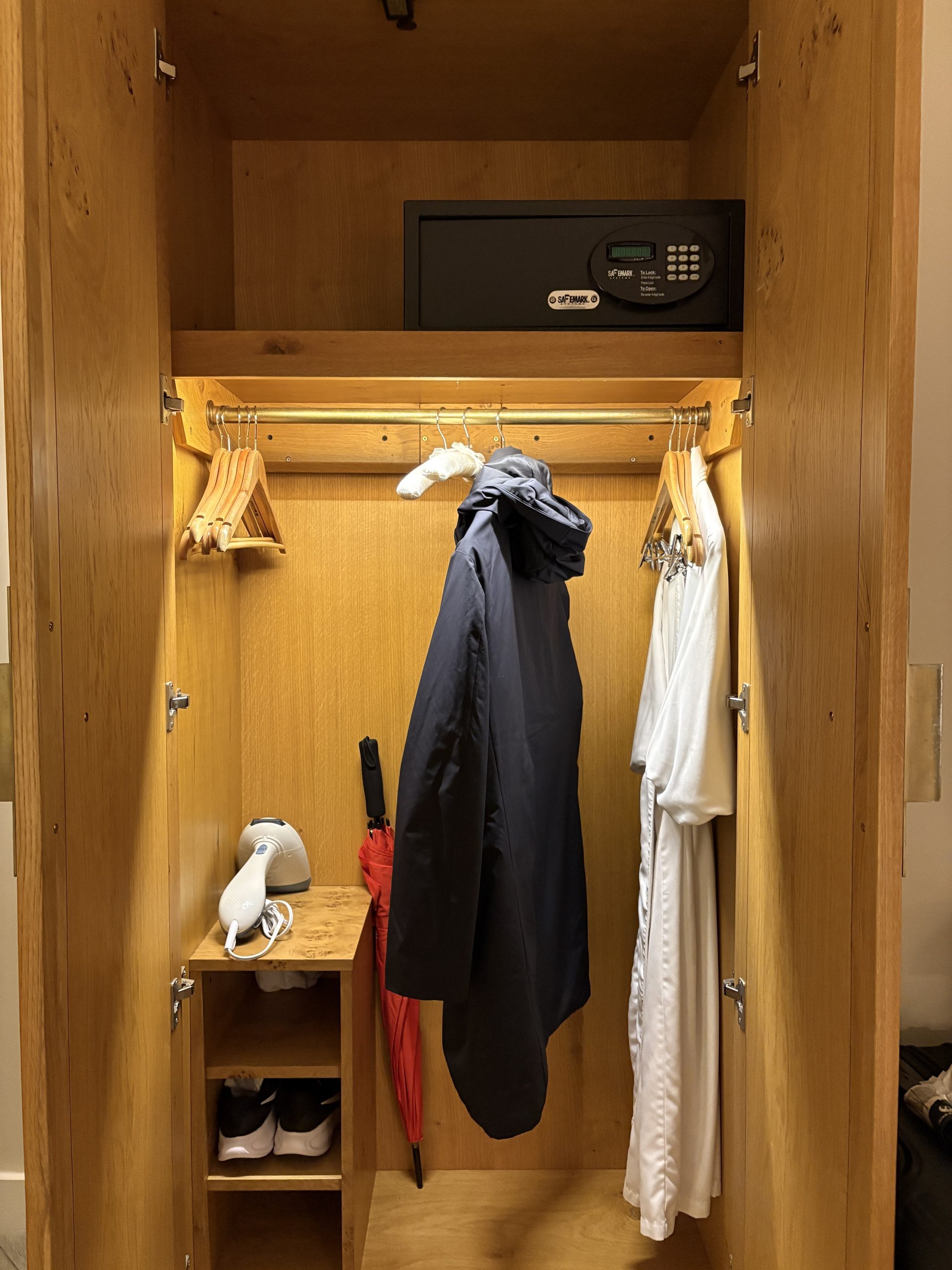 Vertical wardrobe next to the entrance