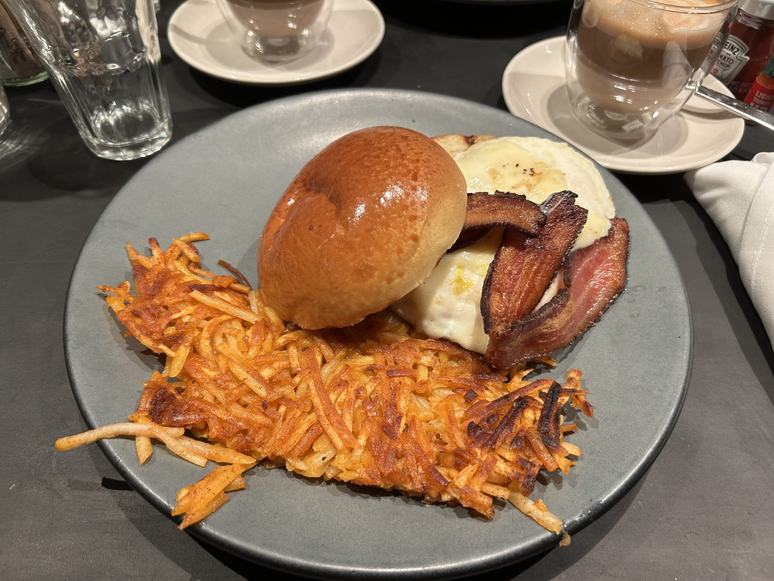 Hash brown, eggs, bacon for breakfast