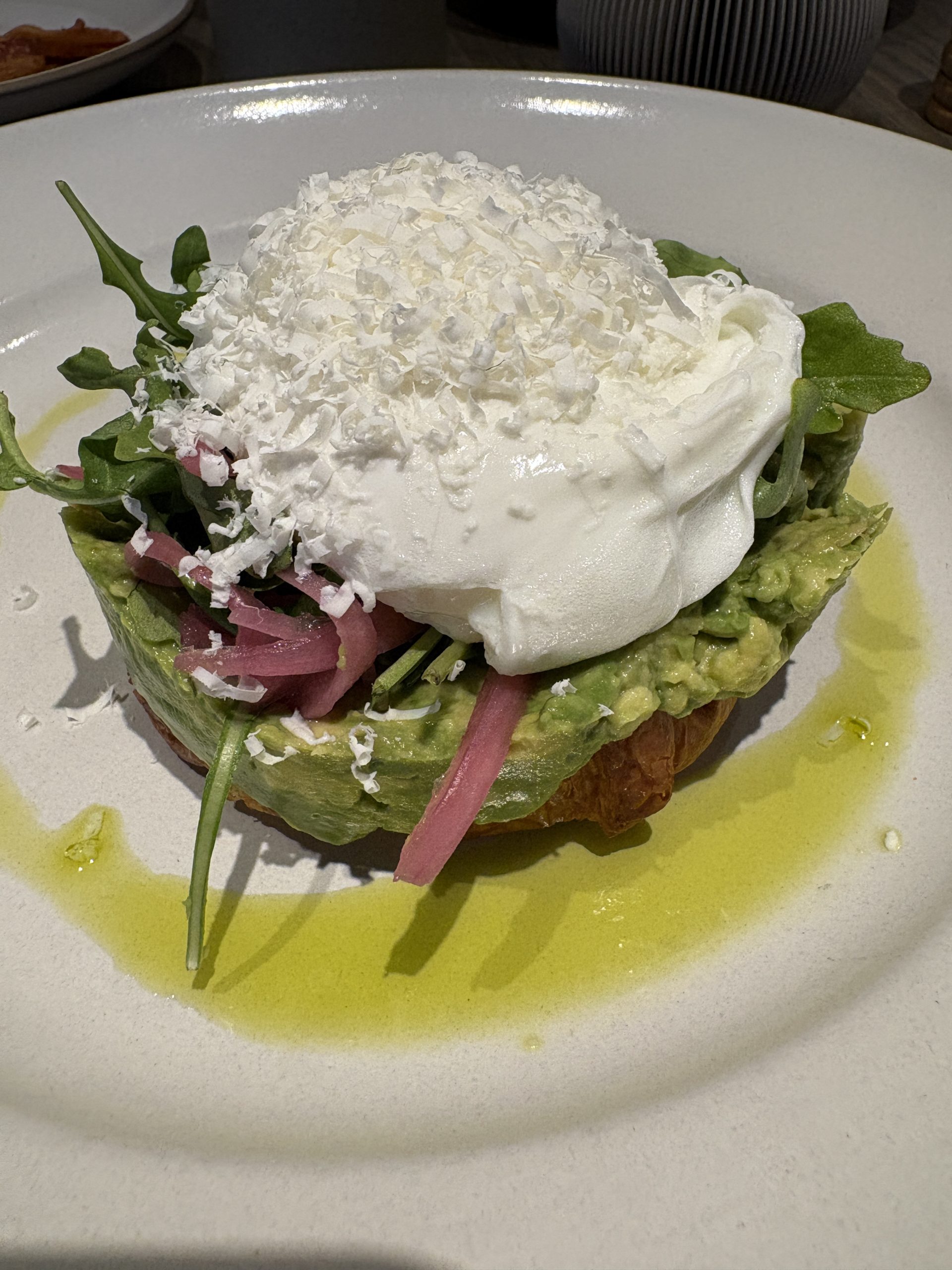 Avocado and griddled croissant