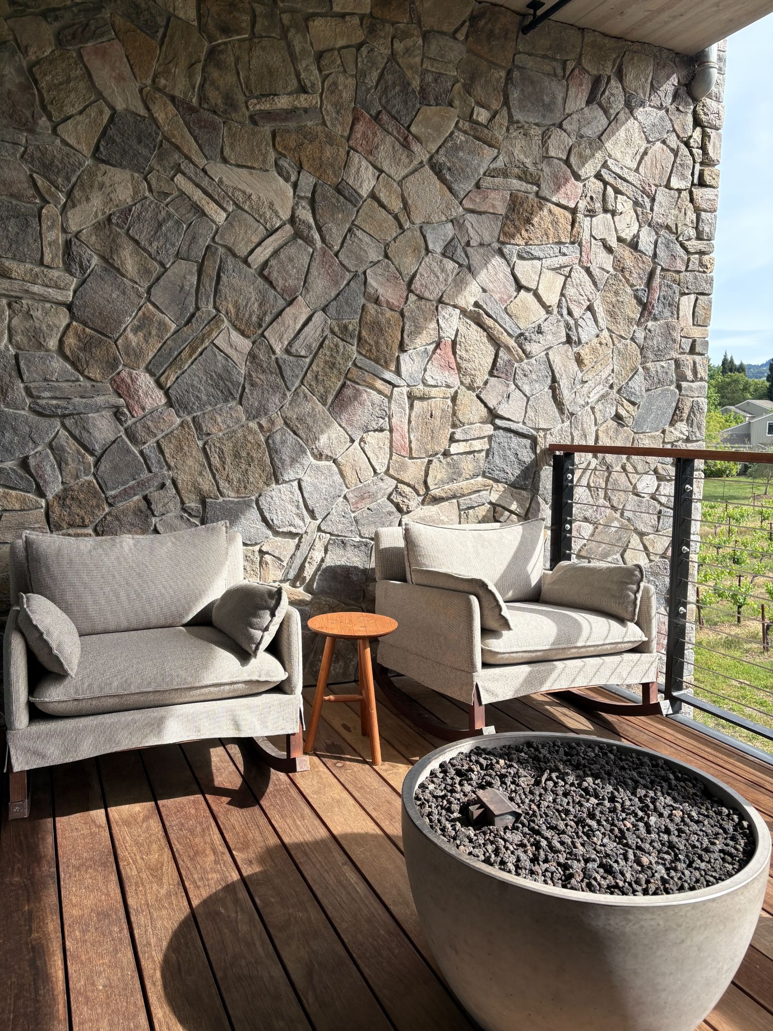Two rocking chair on the patio overlooking the vineyard
