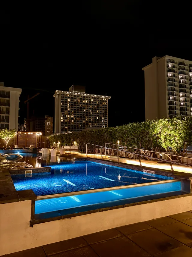 Outdoor splash pool at night