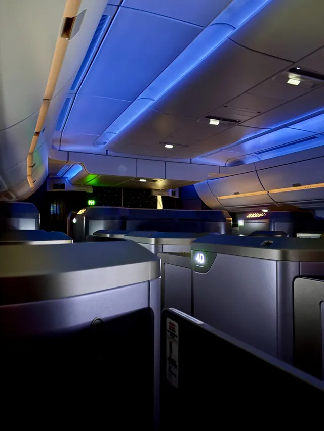 Dimmed lights in the business cabin